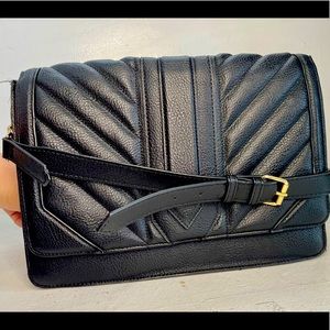 Steve Madden handbag with shoulder and cross body strap.